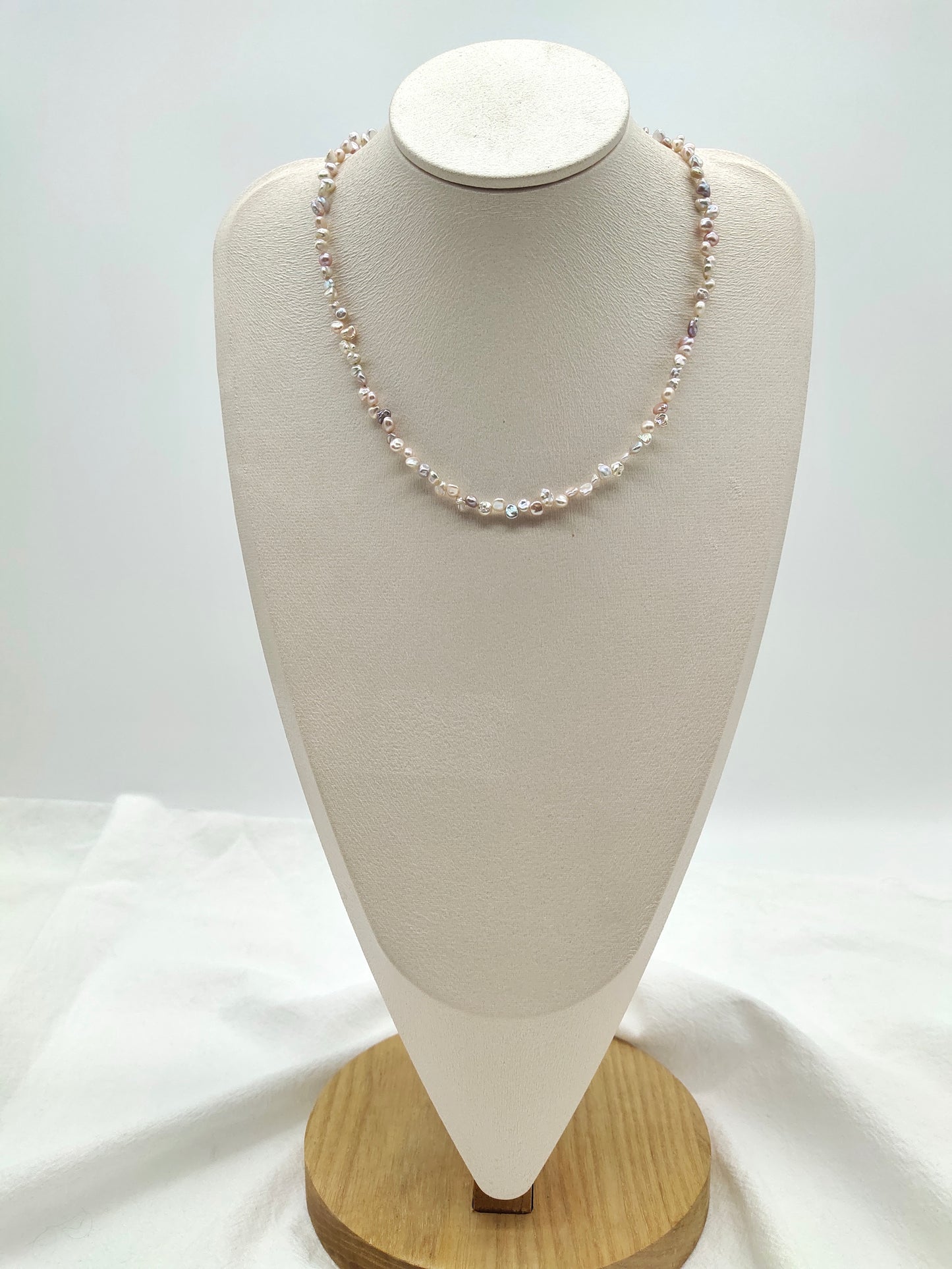 TINY IRIDESCENT FRESHWATER KESHI PEARL NECKLACE