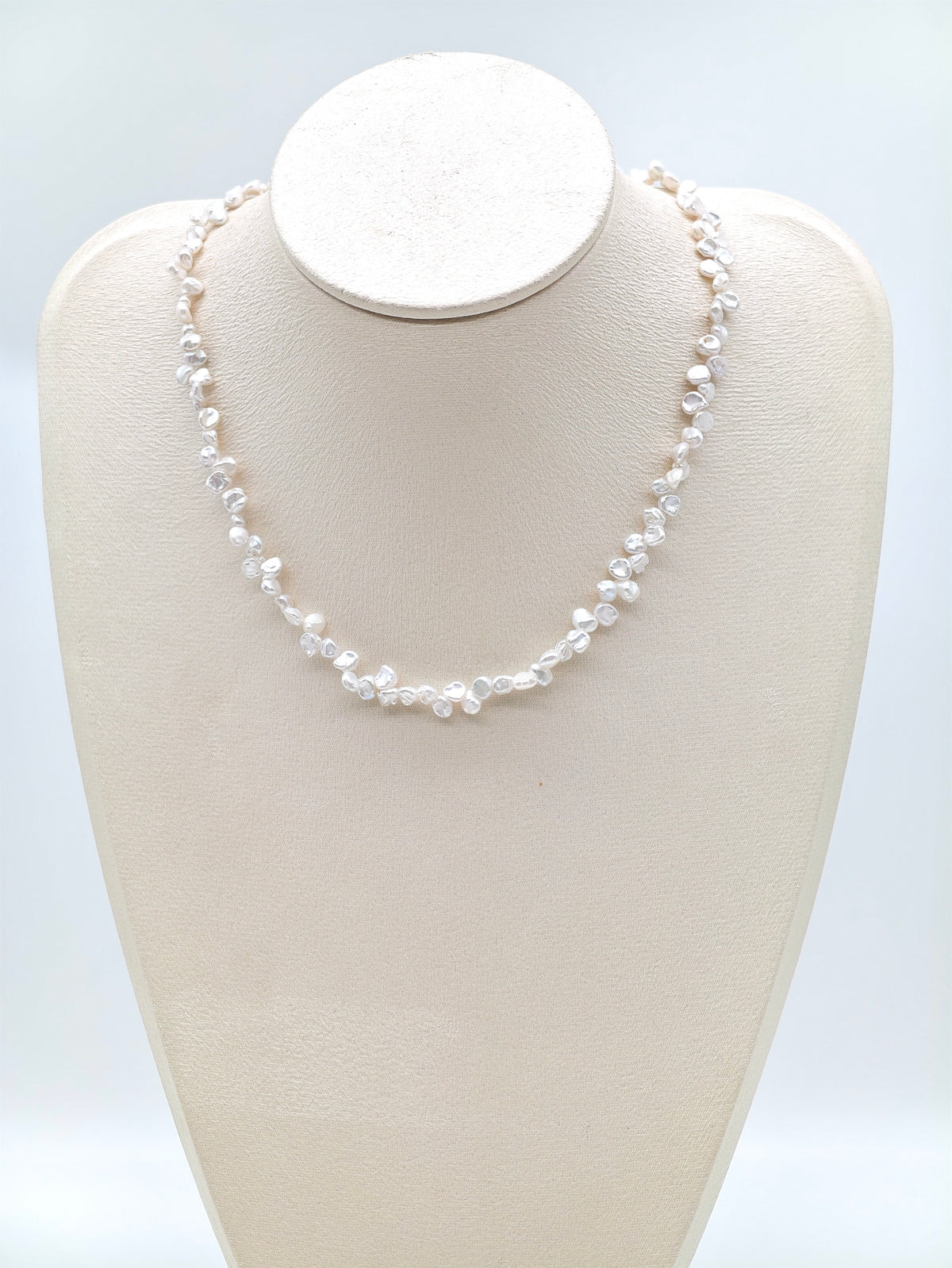 TINY WHITE FRESHWATER KESHI PEARL NECKLACE DESCRIPTION