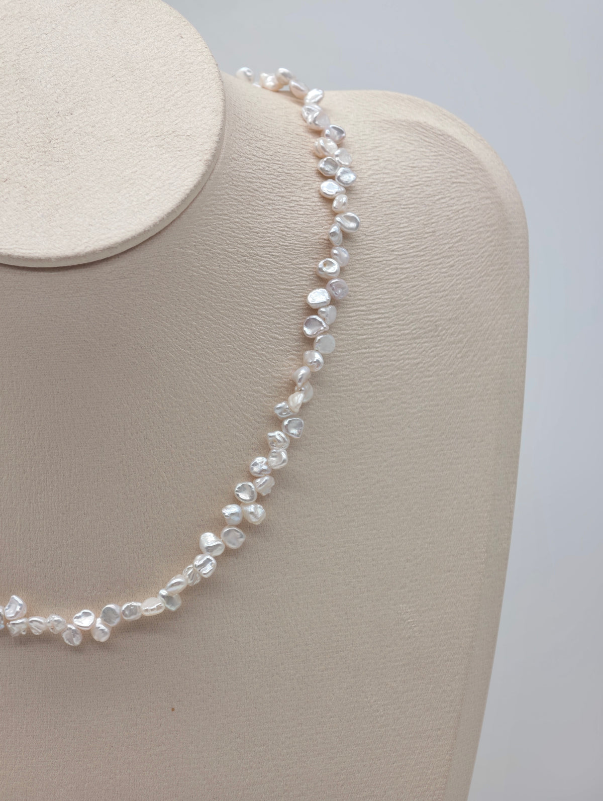 TINY WHITE FRESHWATER KESHI PEARL NECKLACE DESCRIPTION