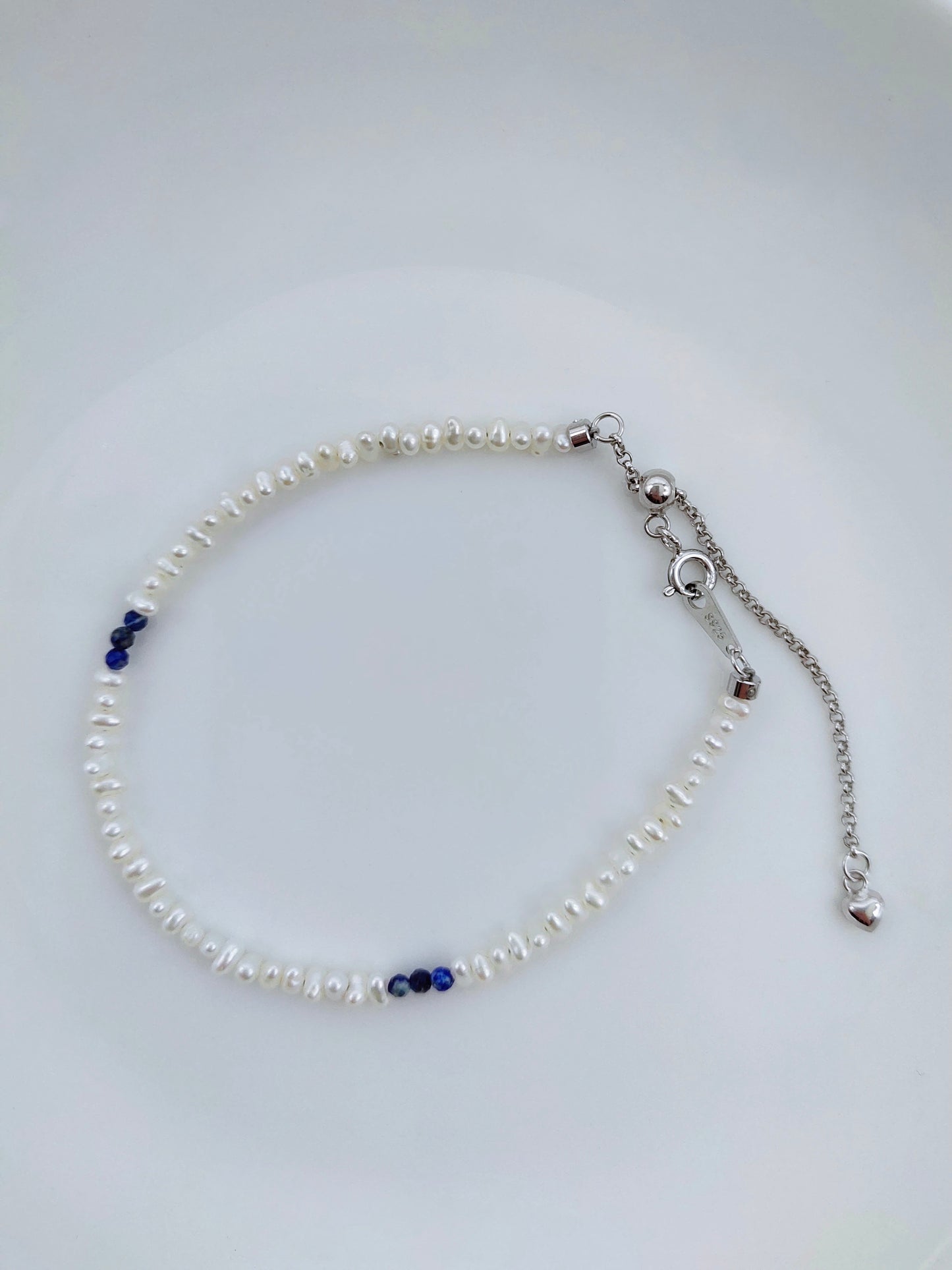 MINI FRESHWATER KESHI PEARL BRACELET WITH NATURAL LAPIS LAZULI