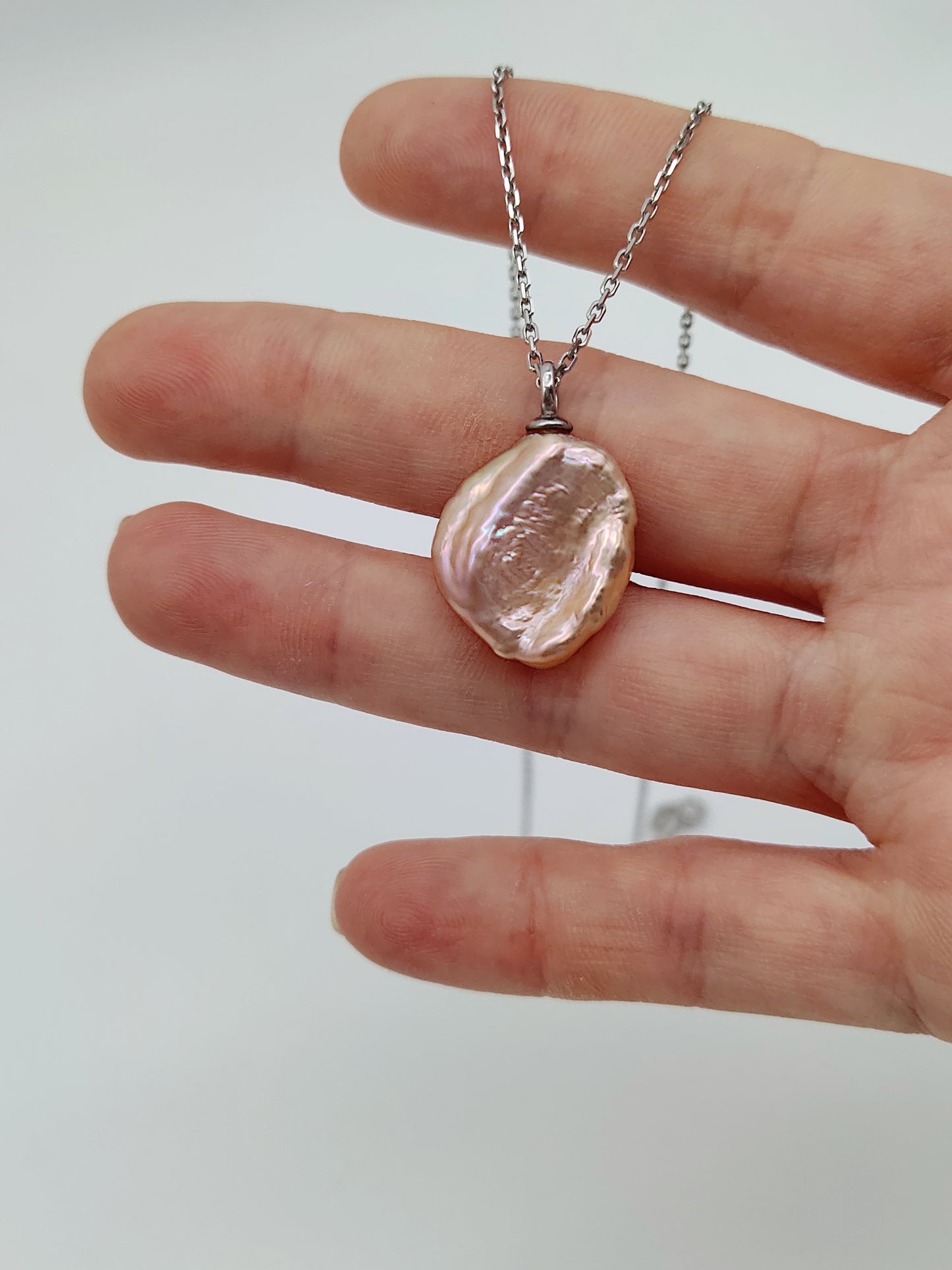 IRIDESCENT KESHI PEARL PENDANT