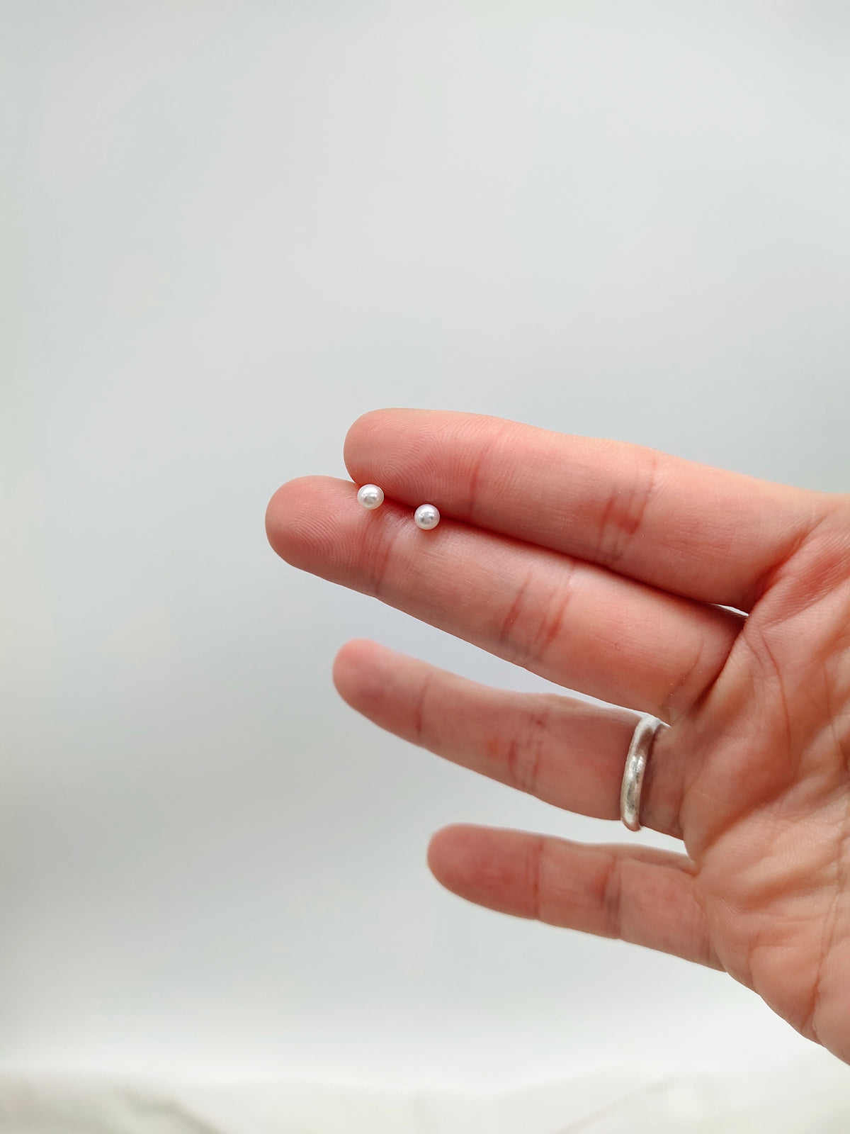 TINY ROUND FRESHWATER PEARL EARRINGS